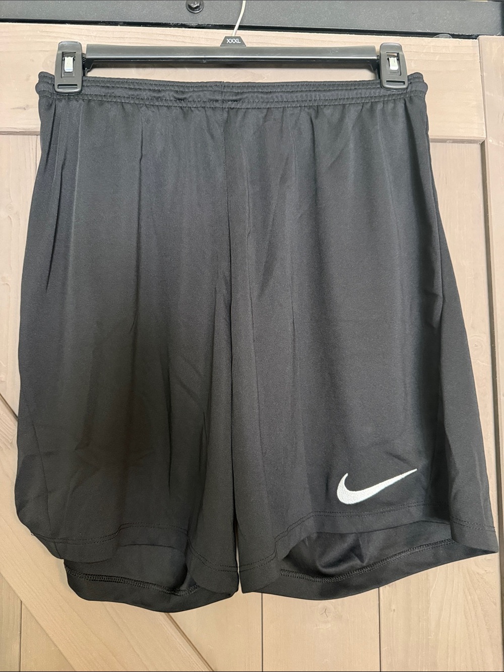 Nike Black Shorts with White Swoosh Logo